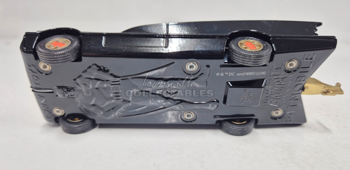 Batmobile with Batman and Robin. Includes operating Rocket Tubes, Chain Slasher Blade and Turbine Jet Exhaust.