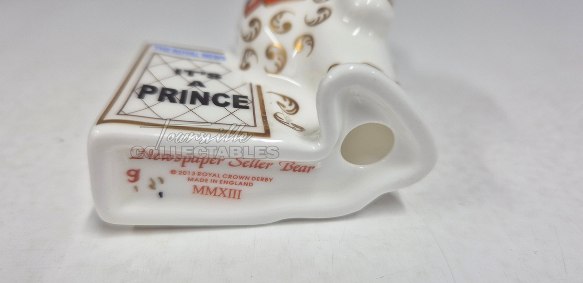 It's A Prince Newspaper Seller. Made in England from fine bone china. Hand decorated, with 22ct Gold accents. Limited Edition #350 of only 1000 pieces world wide