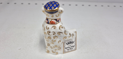 It's A Prince Newspaper Seller. Made in England from fine bone china. Hand decorated, with 22ct Gold accents. Limited Edition #350 of only 1000 pieces world wide