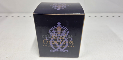It's A Prince Newspaper Seller. Made in England from fine bone china. Hand decorated, with 22ct Gold accents. Limited Edition #350 of only 1000 pieces world wide